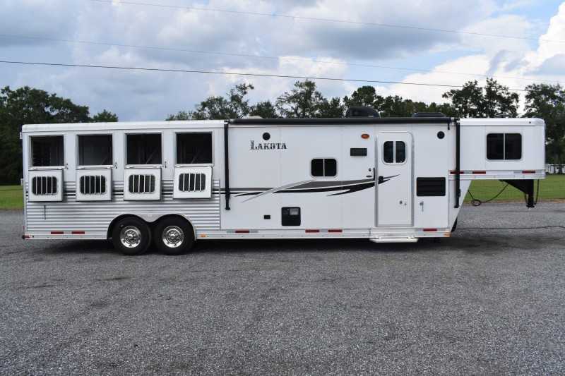 2013 Lakota Charger 8411LQ 4 Horse Trailer with 13′ Short Wall - Image 3