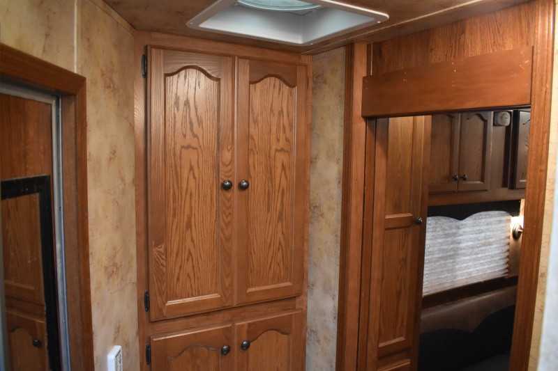 2013 Lakota Charger 8411LQ 4 Horse Trailer with 13′ Short Wall - Image 22