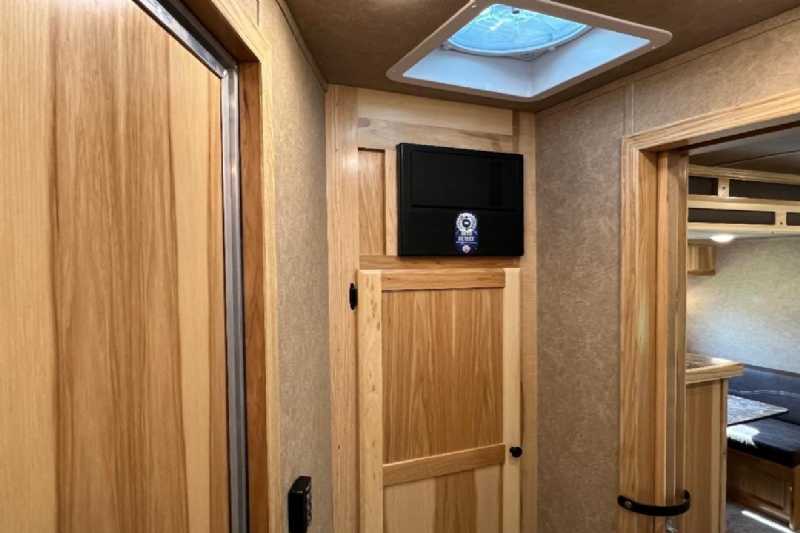 2024 Lakota Charger 8411RKGLQ 4 Horse Trailer with 11′ Short Wall - Image 9